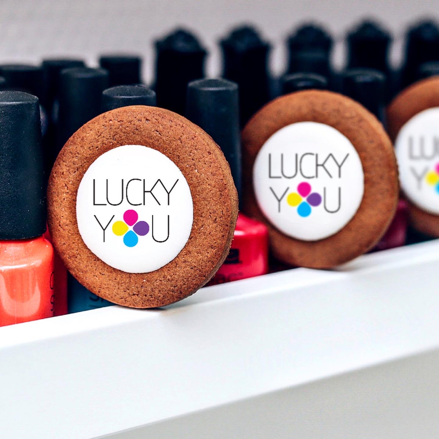 logo-placement-LUCKY-YOU-nail-salons Logo placement. Brand strategy, visual identity and messaging platform for LUCKY YOU, nail salons.By Color.zone creative agency.
